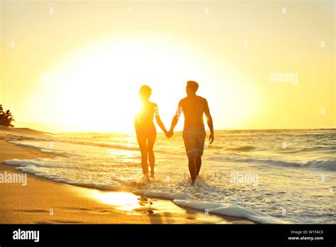 Two Women Holding Hands Beach Hi Res Stock Photography And Images Alamy