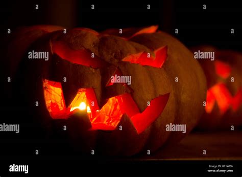 Carved pumpkin faces hi-res stock photography and images - Alamy