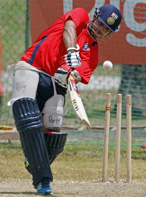 Suresh Raina lofts a delivery during batting practice | ESPNcricinfo.com