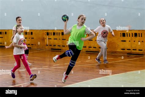 Kids play handball hi-res stock photography and images - Alamy