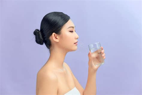 Beautiful Woman With Naked Shoulders Drinking A Glass Of Water Stock Photo Image Of Beauty