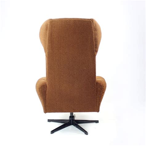 Midcentury Wing Swivel Chair In Brown Fabric Czechoslovakia 1960s For