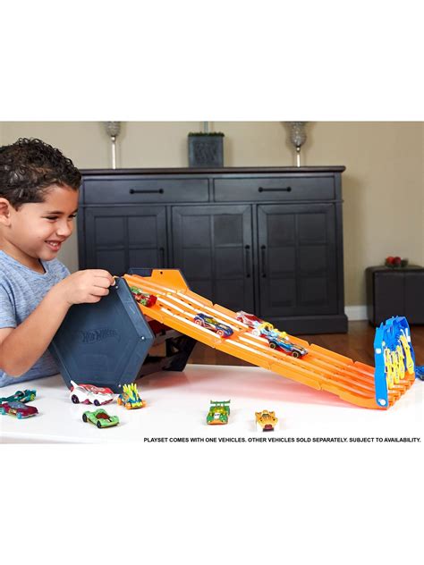 The Hot Wheels® Roll Out Raceway™ Track Set Is The Ultimate In Racing And Storage In One Cool