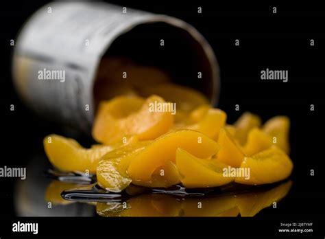 Food Close Up Peach Slices In A Can Packaged Food In Tin Can Stock