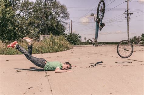 Man Falling Off Bike Stock Photo free download