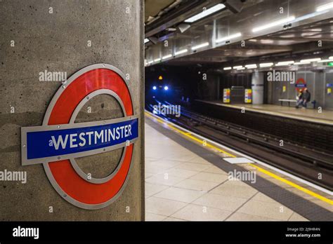 A Train Approaches Westminster Tube Station On The London Underground