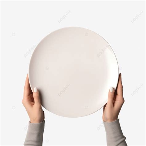 Female Hands Holding An Empty White Plate On A Gray Surface With