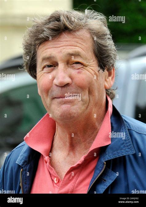 Actor Melvyn Bragg presenter of The South Bank Show outside his home in
