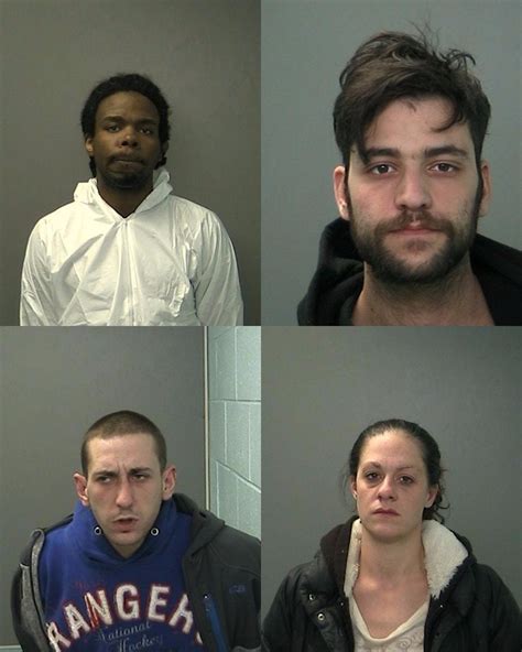 Four People Charged In String Of Bank Gas Station Robberies In Suffolk