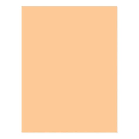 an orange square paper with white border