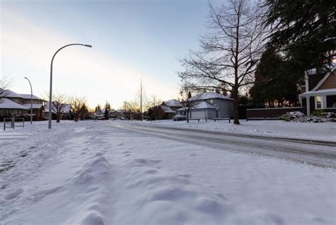 Premium Photo Residential Neighborhood In The Suburbs With White Snow