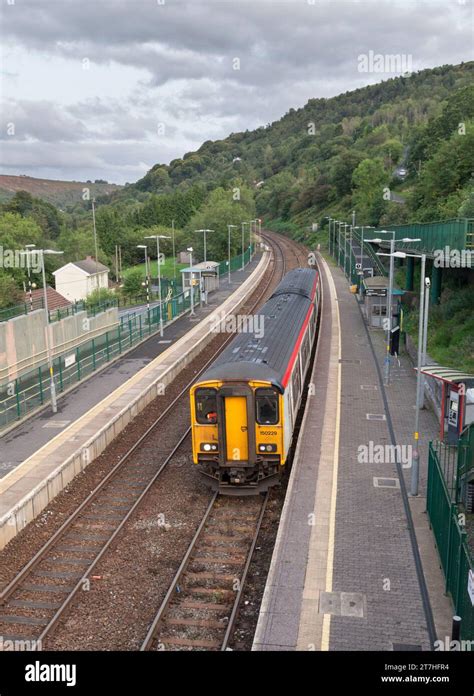 Transport For Wales Class 150 Dmu Train 150229 Calling At Tir Phil Railway Station South Wales