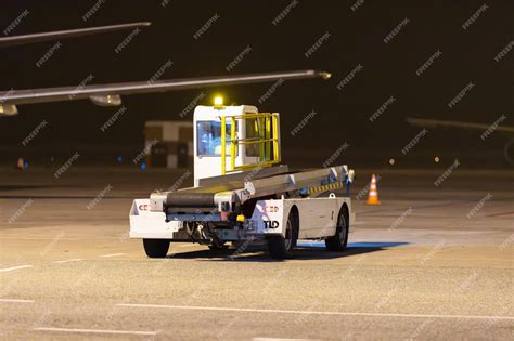 Premium Photo | Cargo loader car at the airport