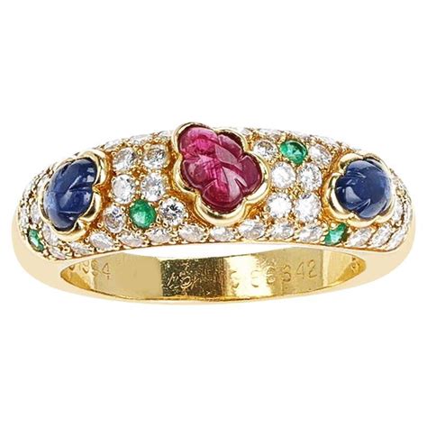 Grande bague Tutti Frutti 18 carats émeraudes rubis saphirs et