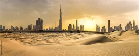 Dubai Downtown Skyline Panorama At Sunset With Desert Sand United Arab