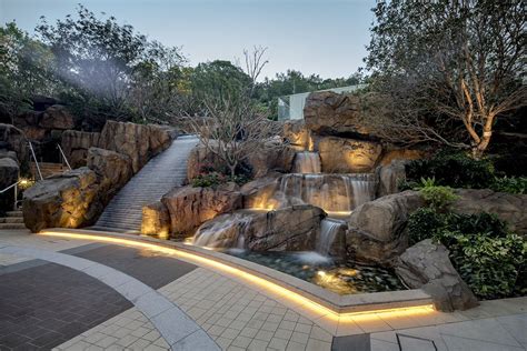 Contemporary Water Feature with Outdoor Waterfall and Lights