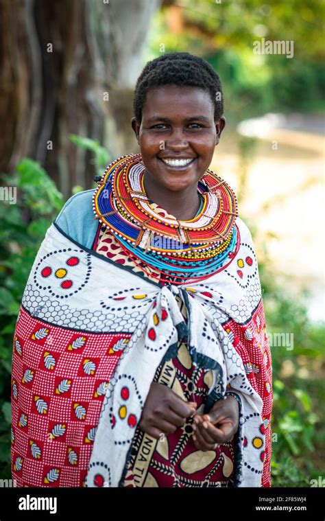 Traditional African Maasai Woman Wearing Beaded Necklace And Colorful