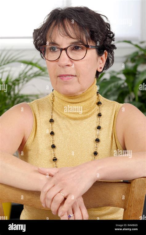 Portrait Of Brunette Mature Woman With Glasses Stock Photo Alamy