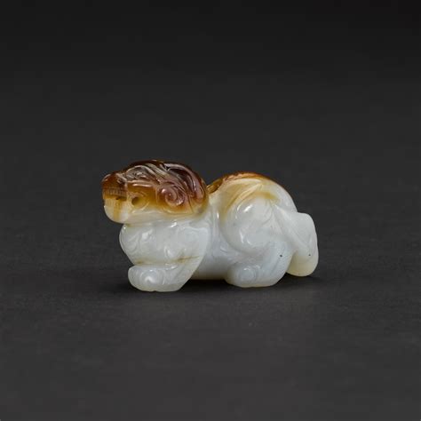 A white and brown jade chimera Song Ming dynasty 宋至明 白玉辟邪 HOTUNG