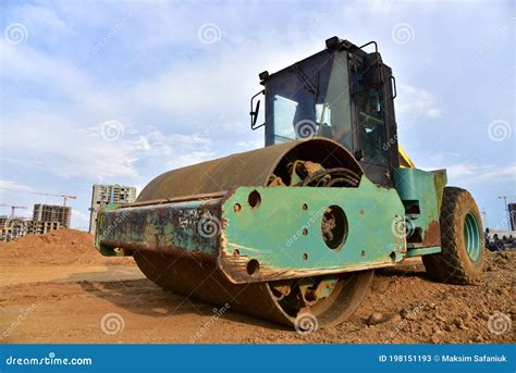 Vibro Roller Soil Compactor Leveling Ground At Construction Site