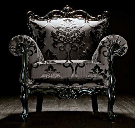 An Ornately Decorated Chair In The Dark