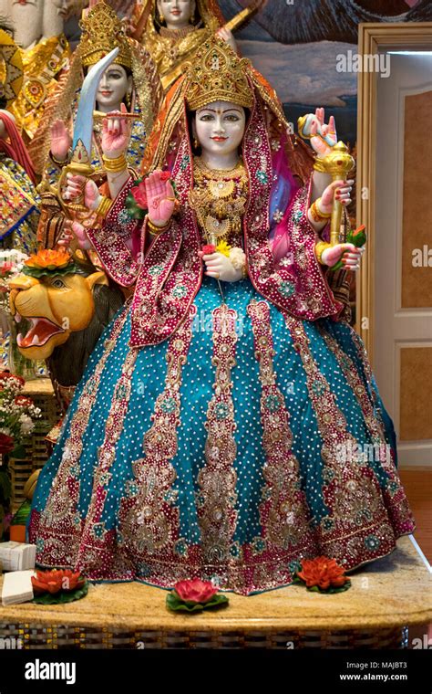 A statue of Durga, the warrior Goddess at the Tulsi Mandir temple in ...