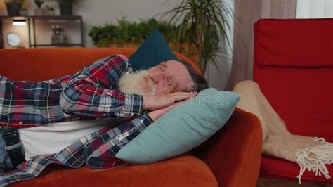 Tired One Senior Old Man Lying Down In Bed Taking A Rest At Home