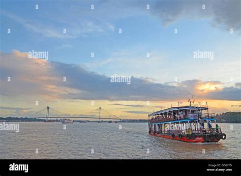 Passenger ferry service over Hooghly river with Second Hooghly Bridge ...