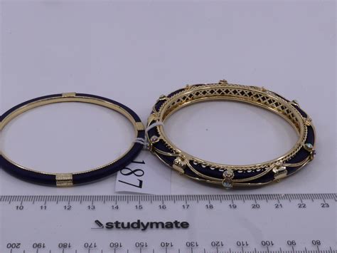 Lot - 2 COSTUME BRACELETS, BLUE AND GOLD COLOURED