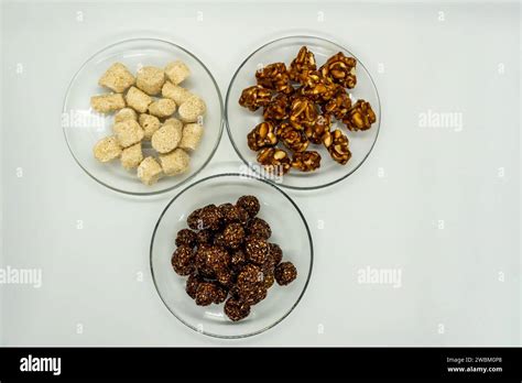 Three Plates Full of Sesame Ladoo, Til ko Laddu, Jaggery Peanuts Laddoo ...