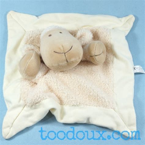 sos doudou mouton Nature et découvertes carré plat beige