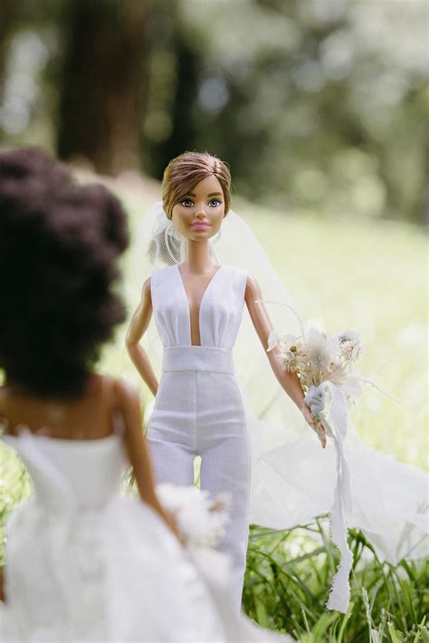 It's a real life Barbie wedding! Two dolls stun in this micro elopement