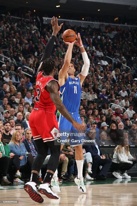 Brook Lopez of the Milwaukee Bucks shoots a three point basket during ...