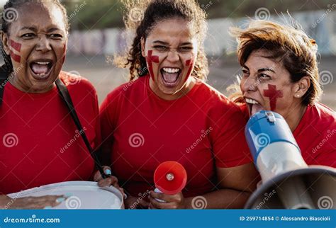 Female Football Fans Exulting while Watching a Soccer Game at the ...