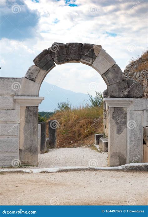 Stone Archway With Carved Keystone At Philippi In Greece Stock Photo