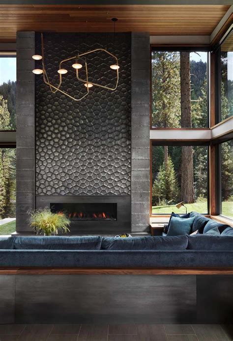 A Floor To Ceiling Fireplace Which Doubles As An Art Piece Features