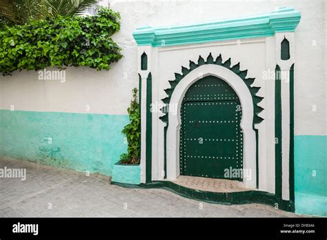 Green Wooden Gate Of Ancient Mosque In Medina Tangier Morocco Stock