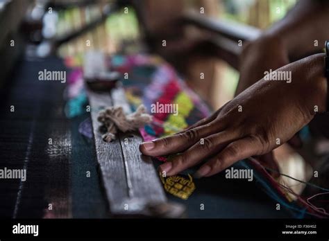 A Woman Works At A Loom In Kachin State Myanmar Stock Photo Alamy