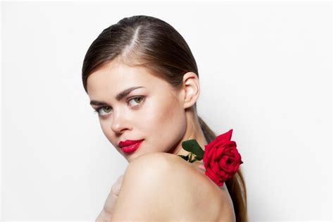 Premium Photo Beautiful Woman Rose Flower On The Shoulders Clear Skin