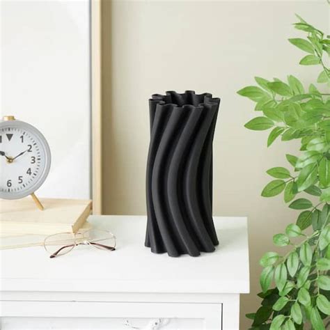 Litton Lane Black Curvy Ribbed Ceramic Abstract Decorative Vase With