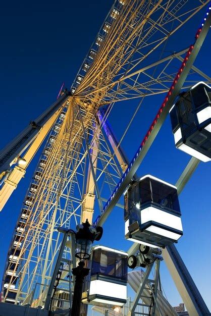 Premium Photo Cabins Of Ferris Wheel And Clear Blue Sky