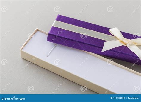 Open Purple Gift Box With Ribbon Bow On Gray Background Stock Image ...