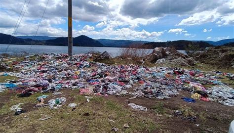 Retiran 2 mil 400 metros cúbicos de desechos del lago de Amatitlán