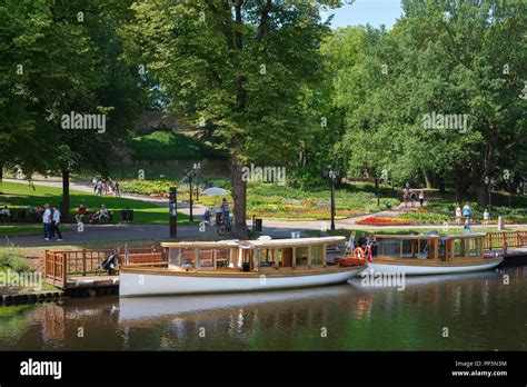 Riga Park View On A Summer Afternoon Of Pleasure Boats Moored In