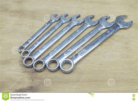 Old Spanner Set In Variable Size In Wooden Background Stock Image