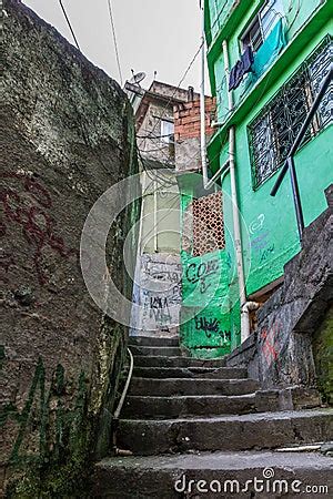 Derelict Buildings With Urban Street Art In A Narrow Passageway In The