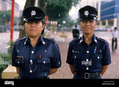 Policewomen in Singapore Stock Photo - Alamy