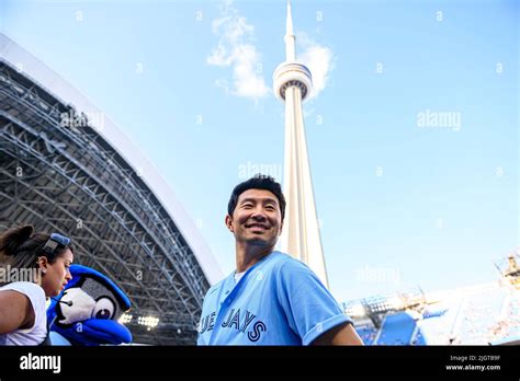 Toronto Canada 12 07 2022 Actor Simu Liu Prepares To Throw The Ceremonial Pitch Ahead Of