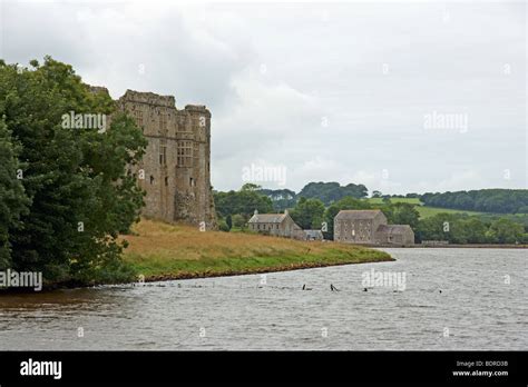 Carew Castle and Tidal Mill in Pembrokeshire West Wales Stock Photo - Alamy