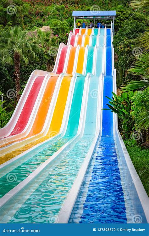 Water Park Slide Attraction Stock Image - Image of activity, colours ...